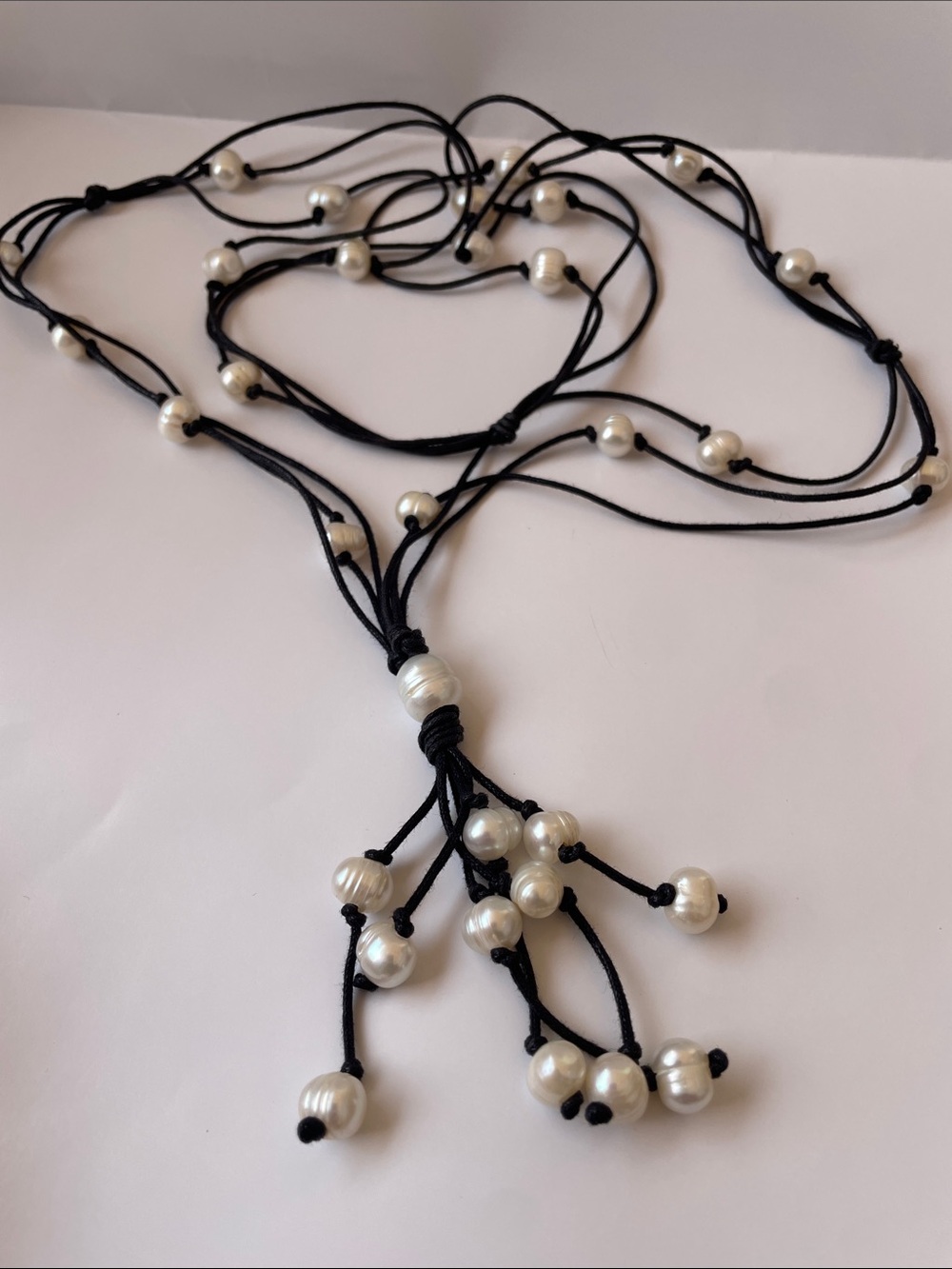 Multi- Strand Black Cord Necklace with White Pearl Beads
